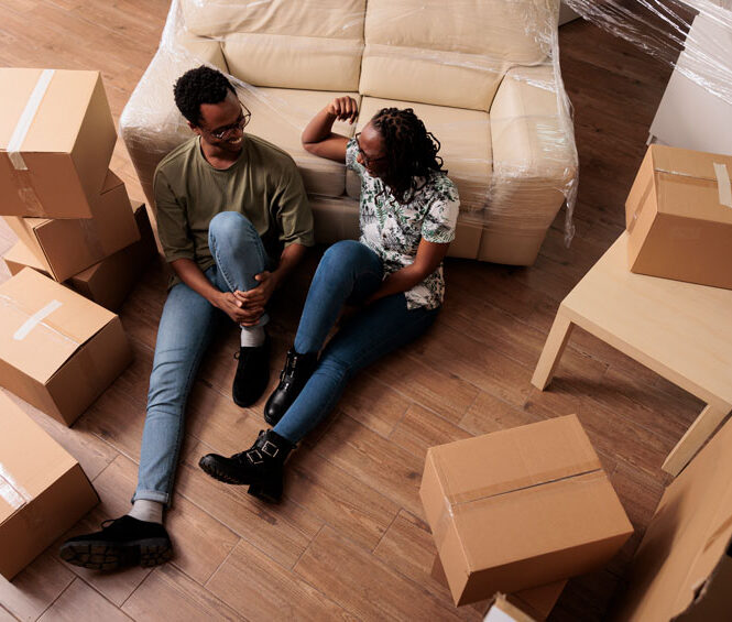 African american couple enjoying new household property